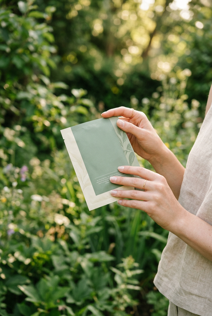 Model Holding CalmaBotanica Soothing Mask - Garden Setting